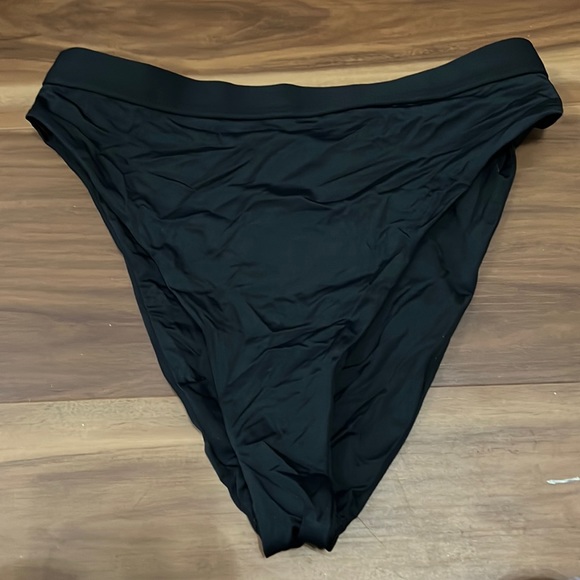 Dolls Kill Other - NWOT dippin daisy bikini bottoms size M blk